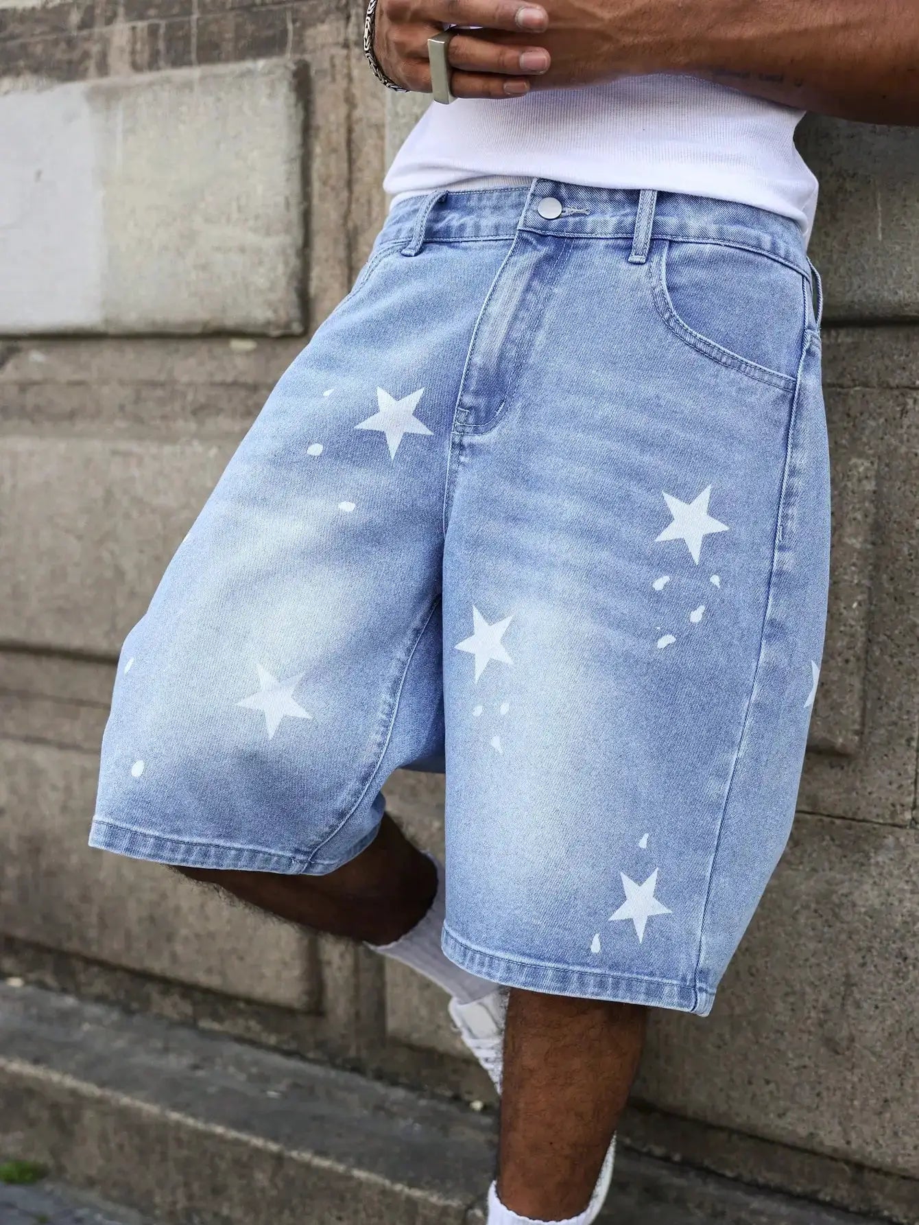 Men's blue denim shorts by Simples Market with white star prints