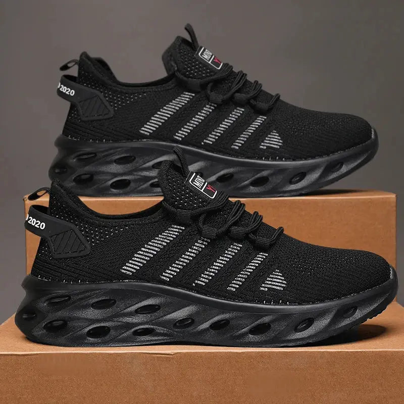 Unisex black running sneakers by Simples Market, breathable knit upper, pair shown