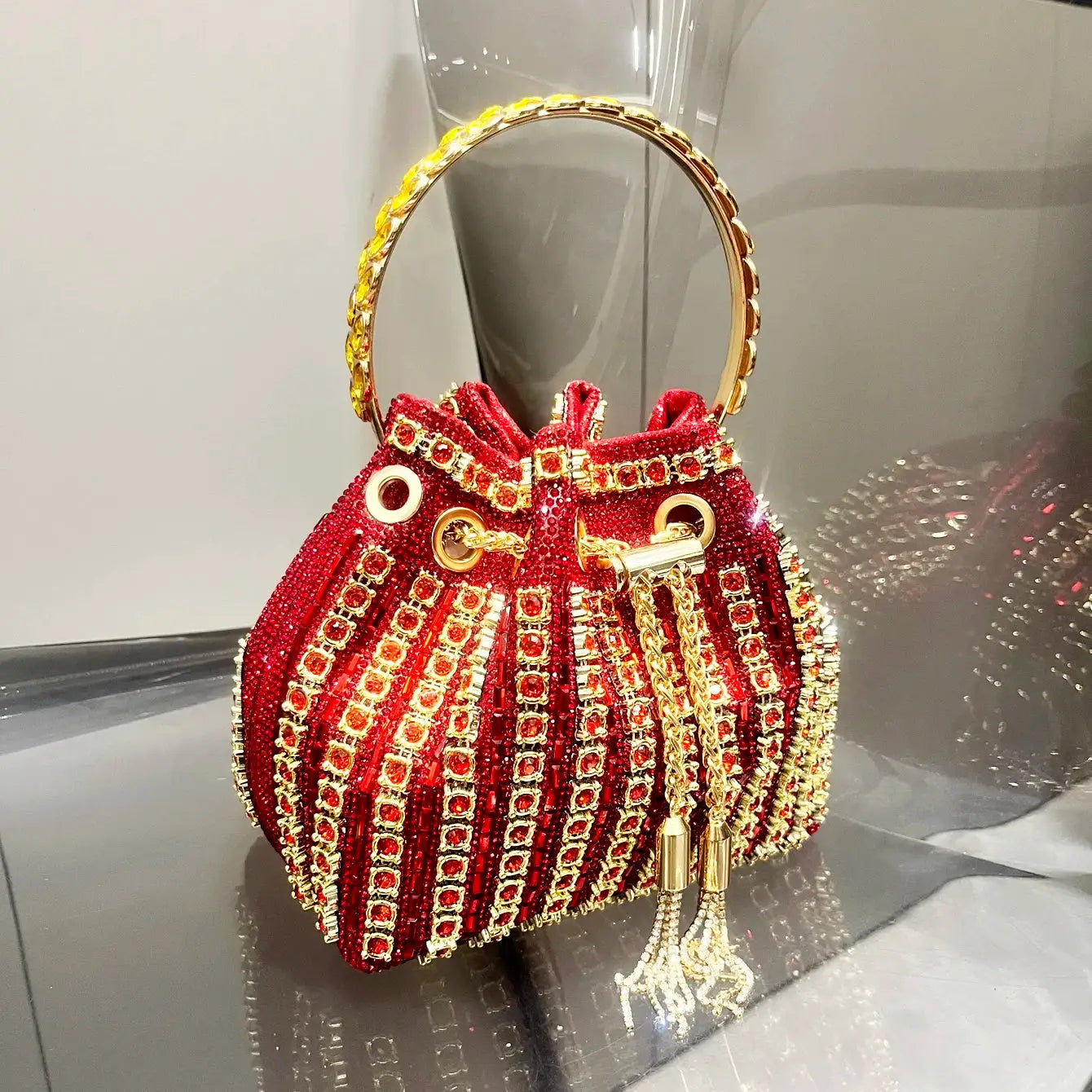 Simples Market red crystal rhinestone bucket clutch with gold ring handle and tassel chains