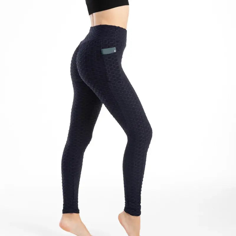 Women's pocket bubble leggings, navy textured high-waist gym pants with back pocket.