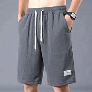 Lce Silk Shorts by Simples Market, gray with white drawstrings and a fashion patch