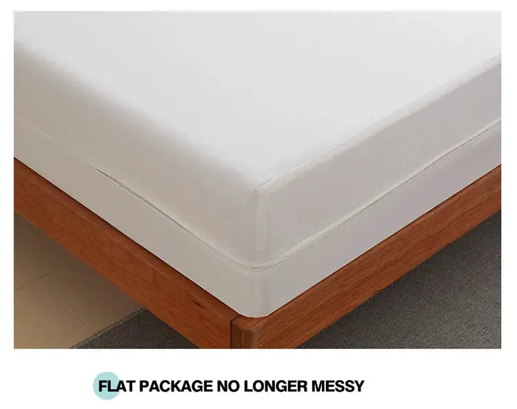 Waterproof mattress protector with zipper, white, fitted over a queen/king mattress on a wooden bed frame