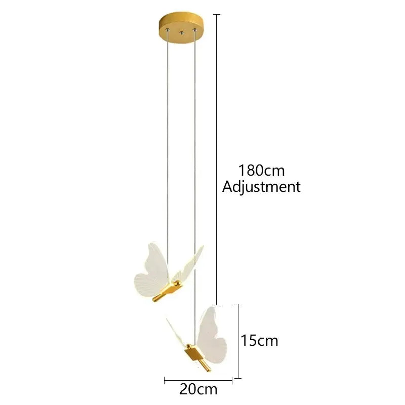 LED modern butterfly pendant light by Simples Market; gold finish with two white butterfly ornaments, adjustable 180cm