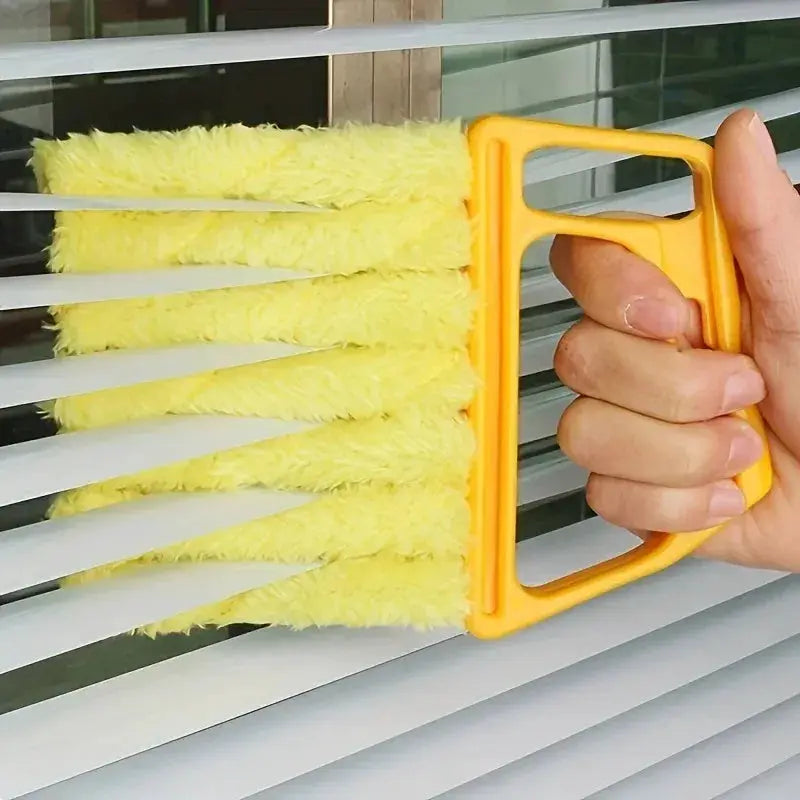 Blinds cleaning brush by Simples Market with detachable washable head; orange handle and four yellow roller pads.