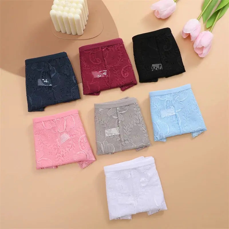 Floral lace panties set; 7-piece in assorted colors displayed flat