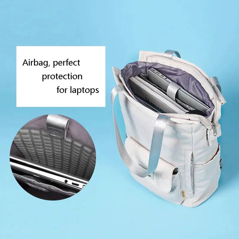 Simples Market women's waterproof canvas laptop backpack with USB port, fits 13–15.6 inch laptops.