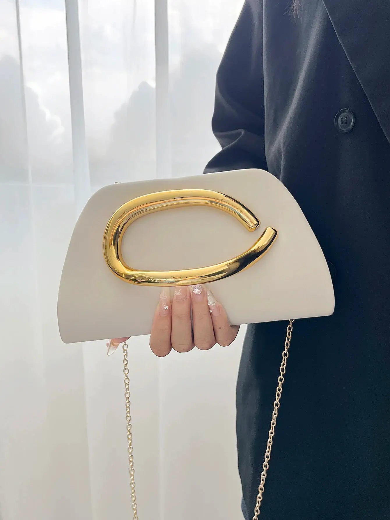 Gold metal-buckle box clutch in white with chain crossbody strap