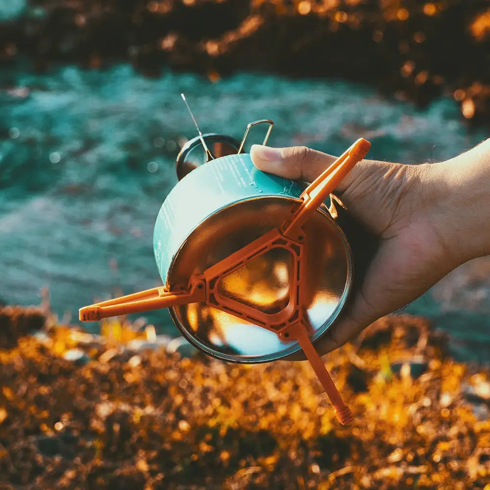 Widesea foldable gas tank bracket with orange tripod arms on a teal canister for outdoor camping