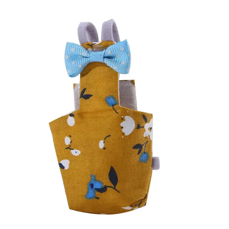 Parrot diaper flight suit with blue polka-dot bowtie in mustard floral fabric for small birds, Simples Market