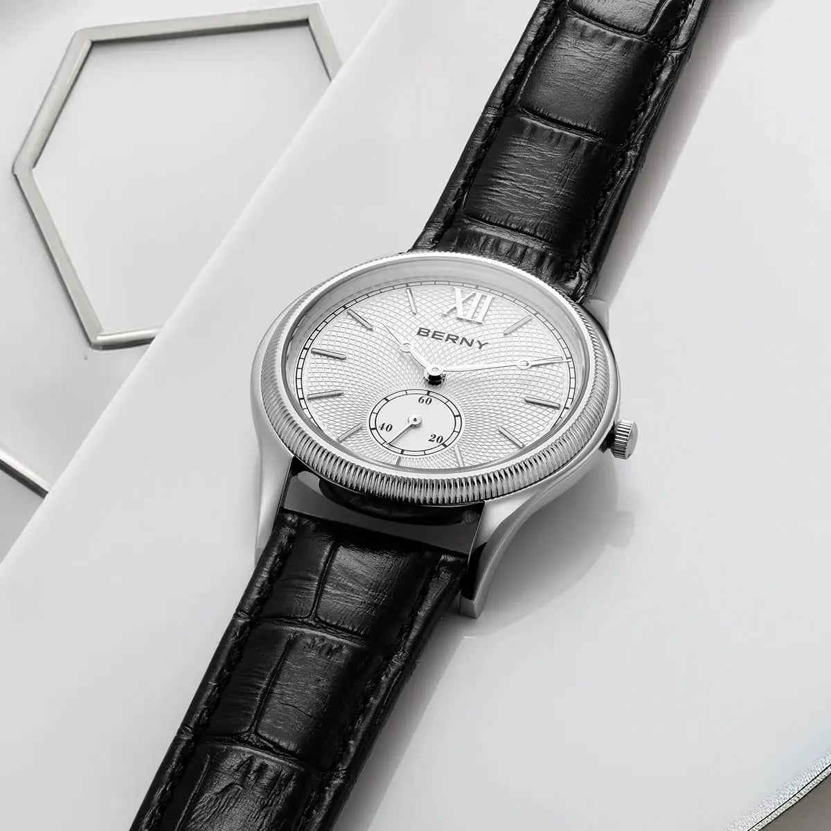 BERNY men's dress watch with silver case, textured white dial, and black leather strap