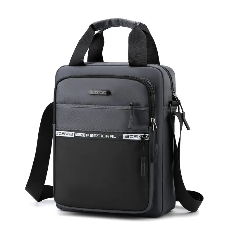 Men's crossbody bag by Simples Market in gray with multiple zip pockets and adjustable strap