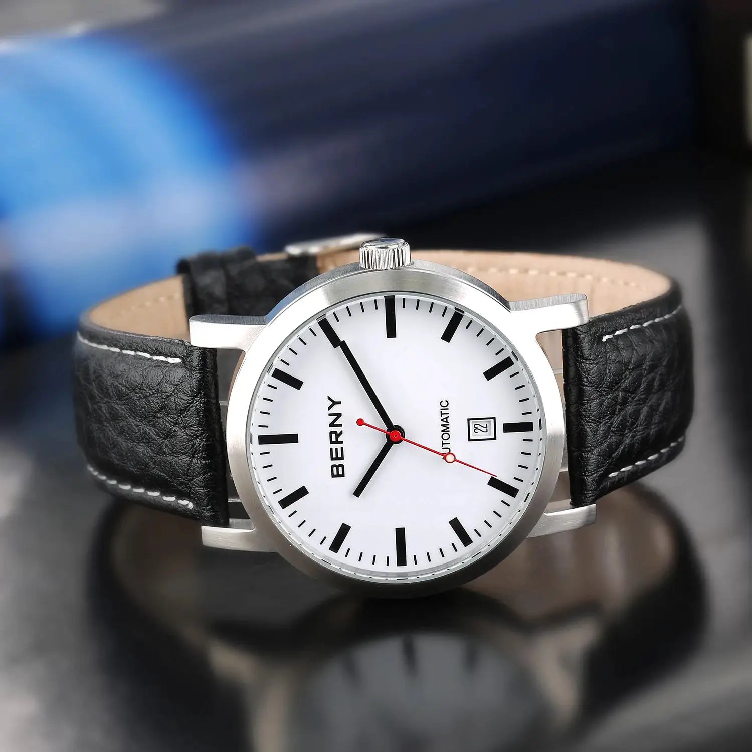 BERNY men's automatic wristwatch with white dial, date window, stainless steel case, black leather strap.