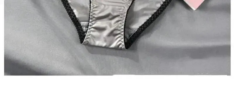 Girls satin panties by Simples Market with letter embroidery, gray with black trim