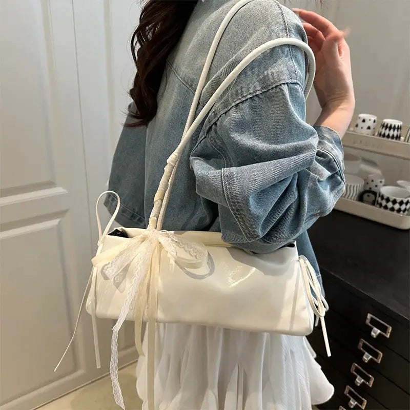 White PU square shoulder bag with ribbon bow accent and long strap