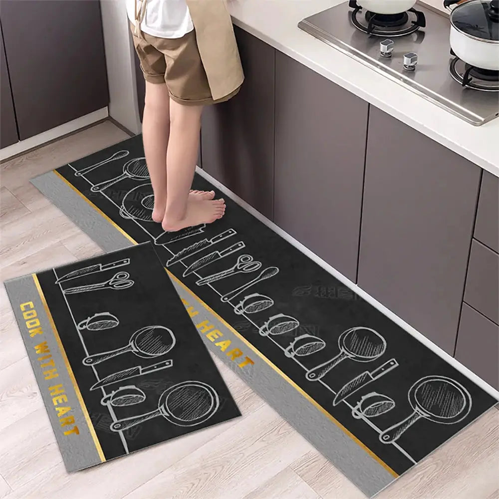 Non-slip kitchen mat runner set of 2 in crystal velvet, black with white utensil sketches and yellow border.
