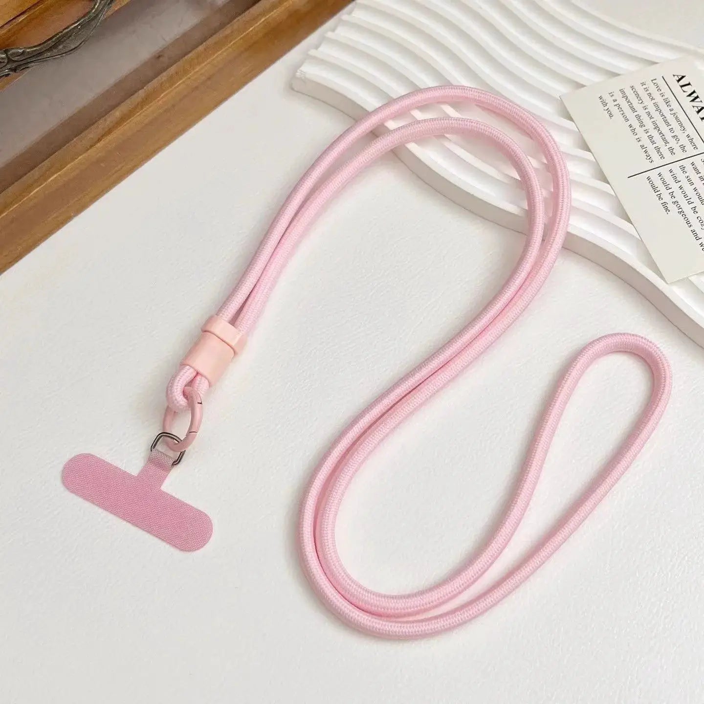 Pink double-strap phone lanyard with metal clasp, crossbody rope strap