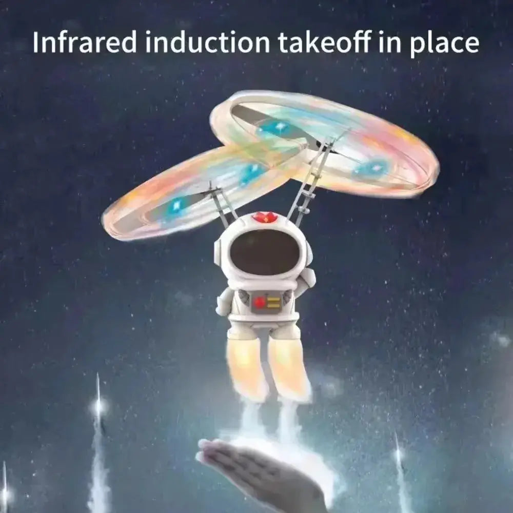 Levitating white astronaut drone toy by Simples Market with colorful LED ring propellers