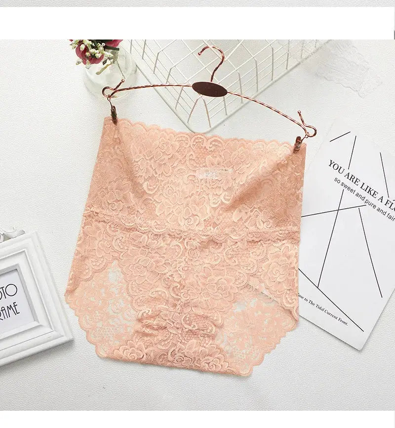 Seamless lace high-waist shapewear panties by Simples Market in peach with scalloped edges.