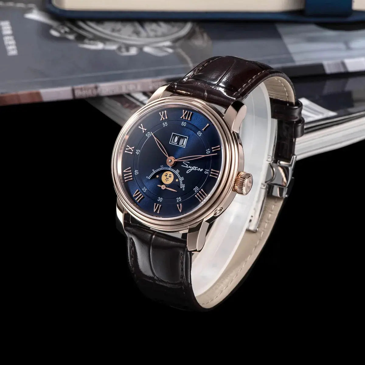 Sugess moonphase men's 40mm automatic watch with blue sandstone dial, rose-tone steel case and brown leather strap