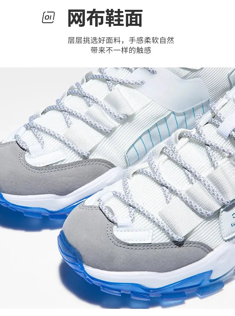 Men's sneakers with gray and white upper, blue outsole, breathable mesh and lace-up design
