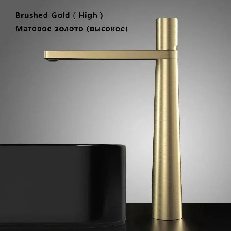 Simples Market brushed-gold brass basin faucet with tall cylindrical body and horizontal spout for grey washbasin