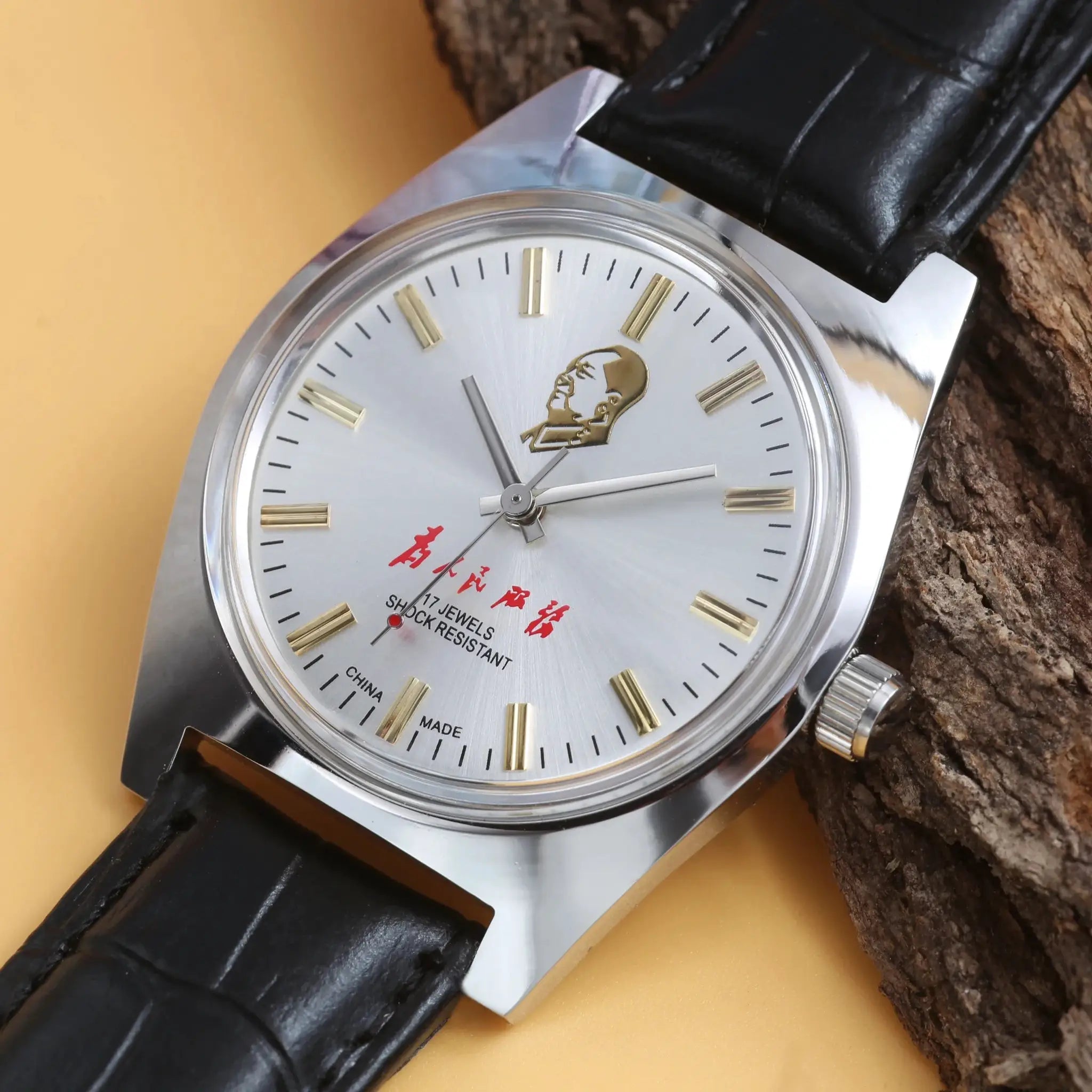 Simples Market 7120 hand-wind mechanical men's watch with silver dial, gold baton markers, black leather strap