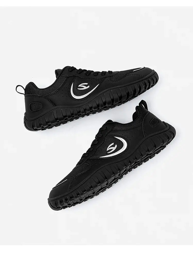 Pair of black HOBIBEAR unisex wide-toe lace-up sneakers with rugged rubber outsole.