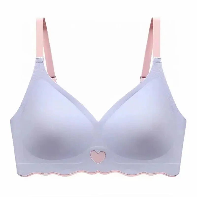 Women’s seamless bra by Simples Market with adjustable pink straps, lavender cups, heart center, scalloped hem