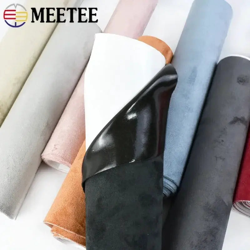 Synthetic leather self-adhesive fabric rolls in assorted colors with suede finish; MEETEE logo visible
