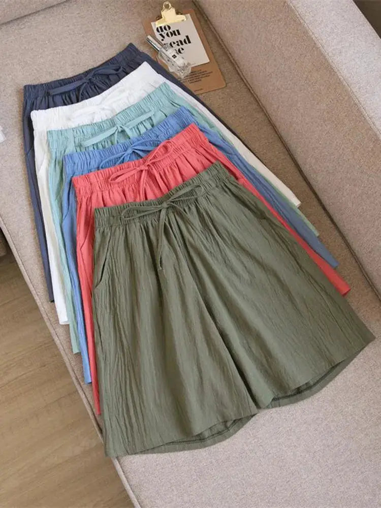 Simples Market women's cotton shorts; high-waist, loose fit with two pockets, multicolor assortment.
