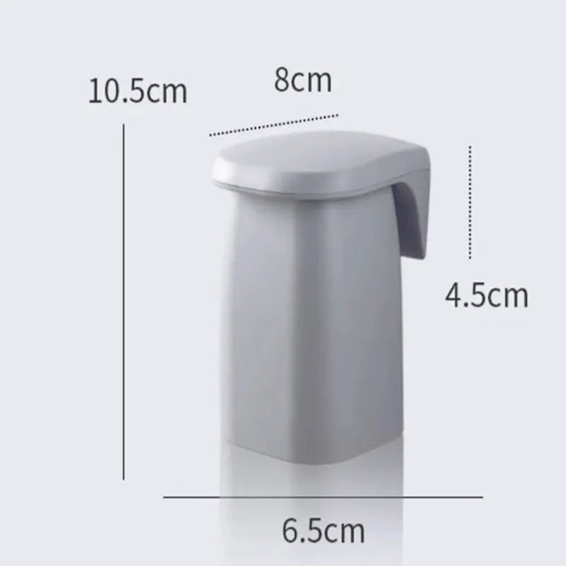 Simples Market magnetic wall-mounted mouthwash cup holder, minimalist white plastic toothbrush storage rack.