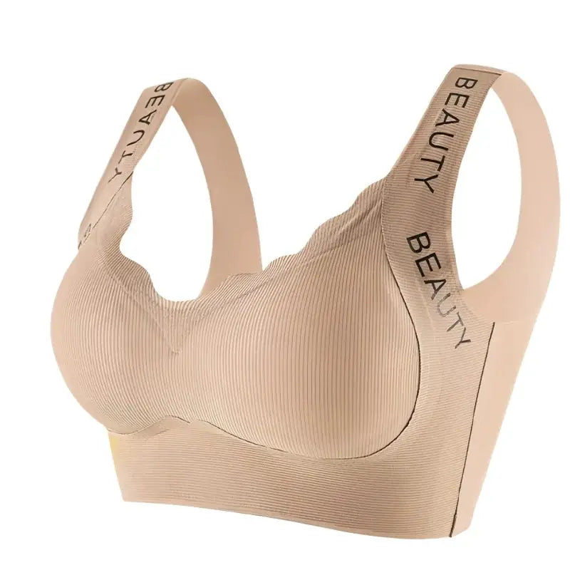 Beige ribbed wireless push-up bra with wide straps and wave neckline; seamless plus-size
