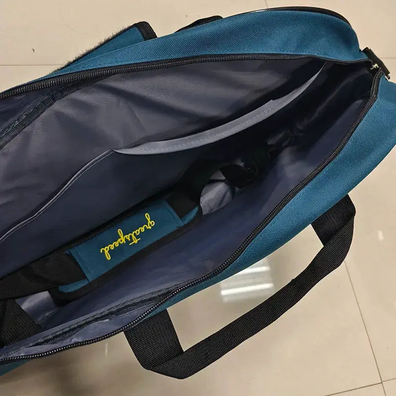 GREATSPEED racket bag by Simples Market, teal blue with black handles and gray interior
