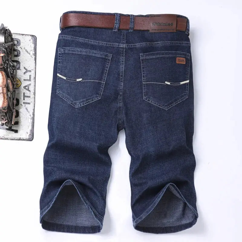 Simples Market men's slim denim shorts in dark blue with brown belt and white-stitched back pockets