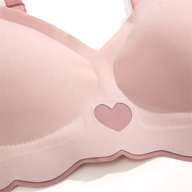Pink push-up bra with heart motif, seamless wireless cups
