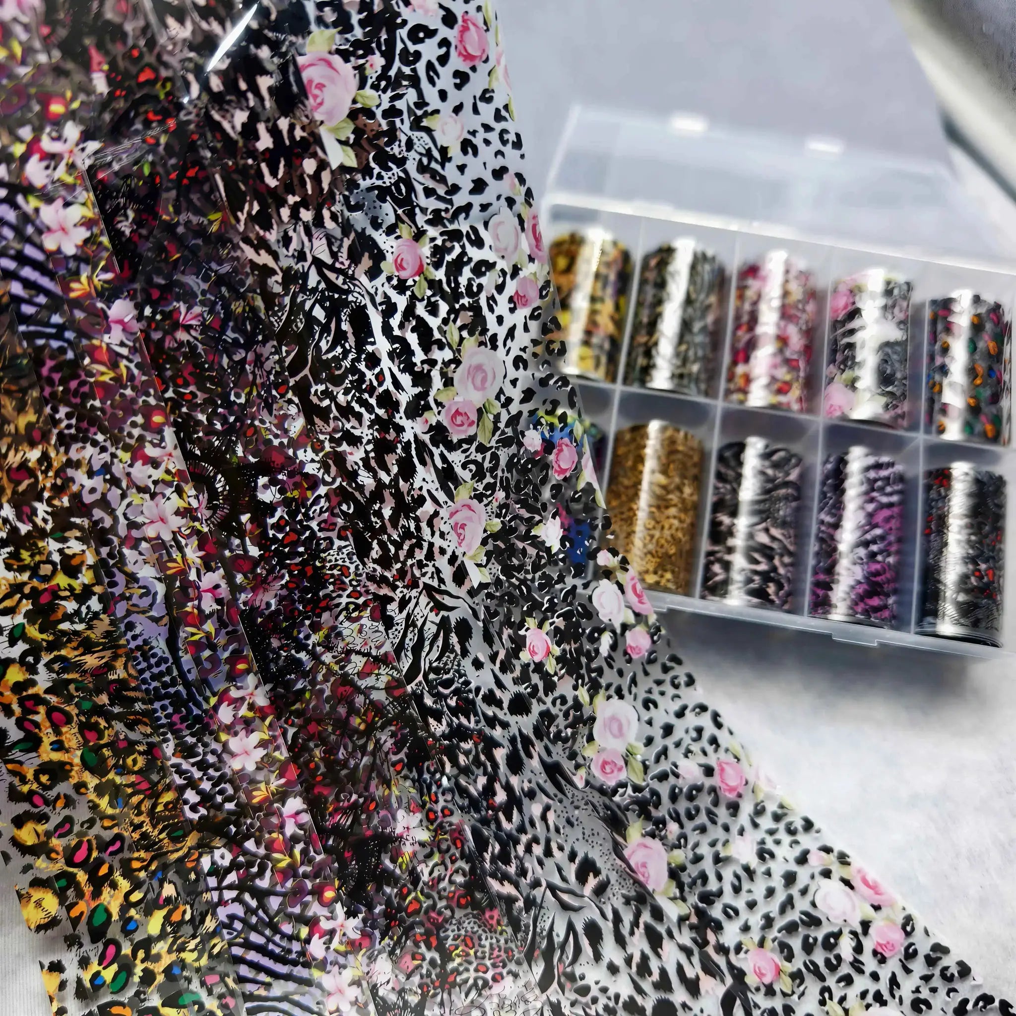 Simples Market 10 rolls nail foils set with floral and animal-print patterns for nail art transfers.