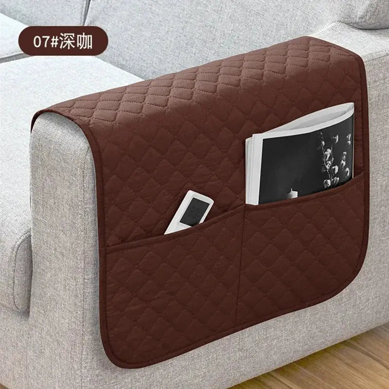 Brown quilted sofa armrest cover with pockets, water-repellent slipcover for remote and phone.