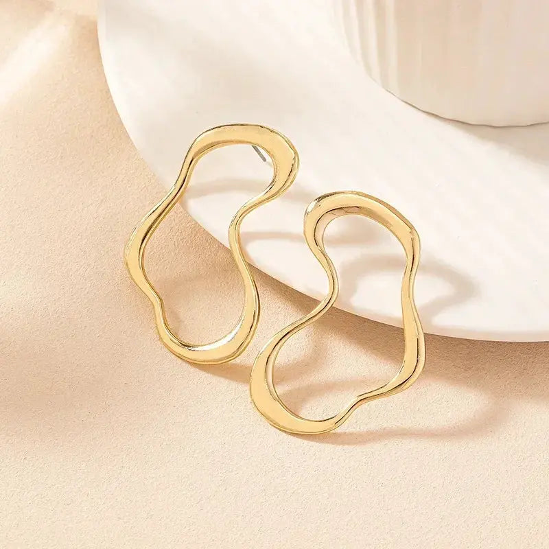 Gold-tone irregular-loop earrings with shell texture, set of 2