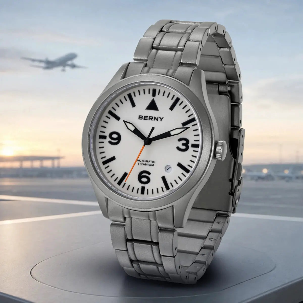 BERNY Aviation Titanium Automatic Watch with white dial, black markers, orange second hand, metal bracelet