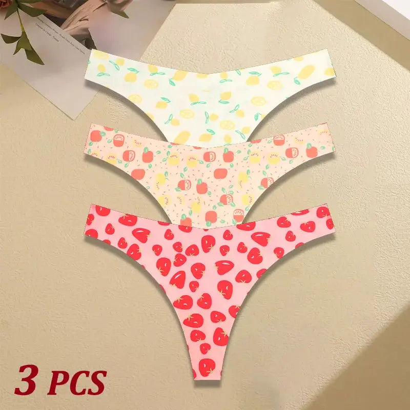 3-piece set of seamless ultra-thin women’s thongs with fruit-print designs in white, beige, and pink