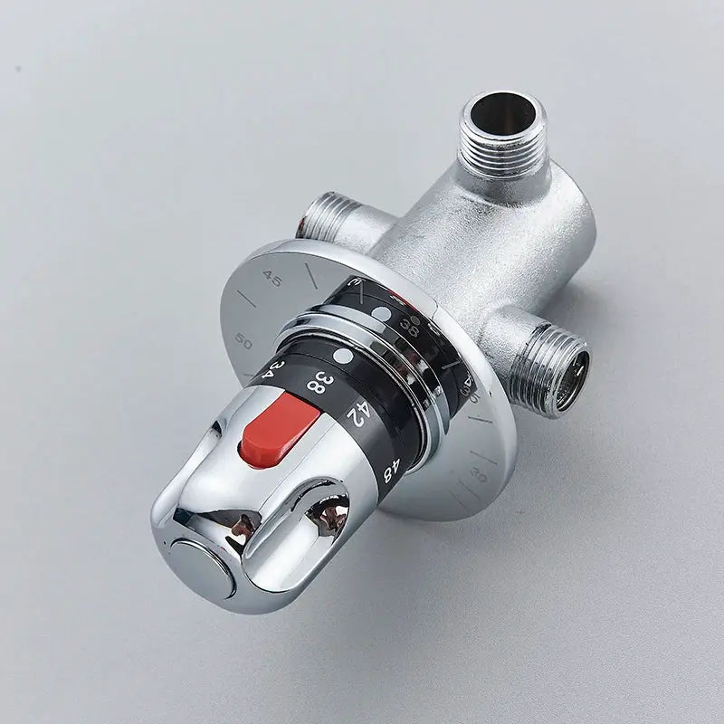 Brass thermostatic mixing valve by Simples Market with chrome finish and red control knob.