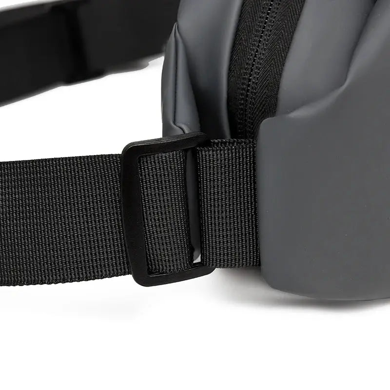 Men's minimalist waterproof waist bag with black strap and gray pouch