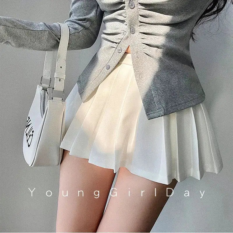 Pleated mini skirt with built-in shorts, high-waist white A-line style for women