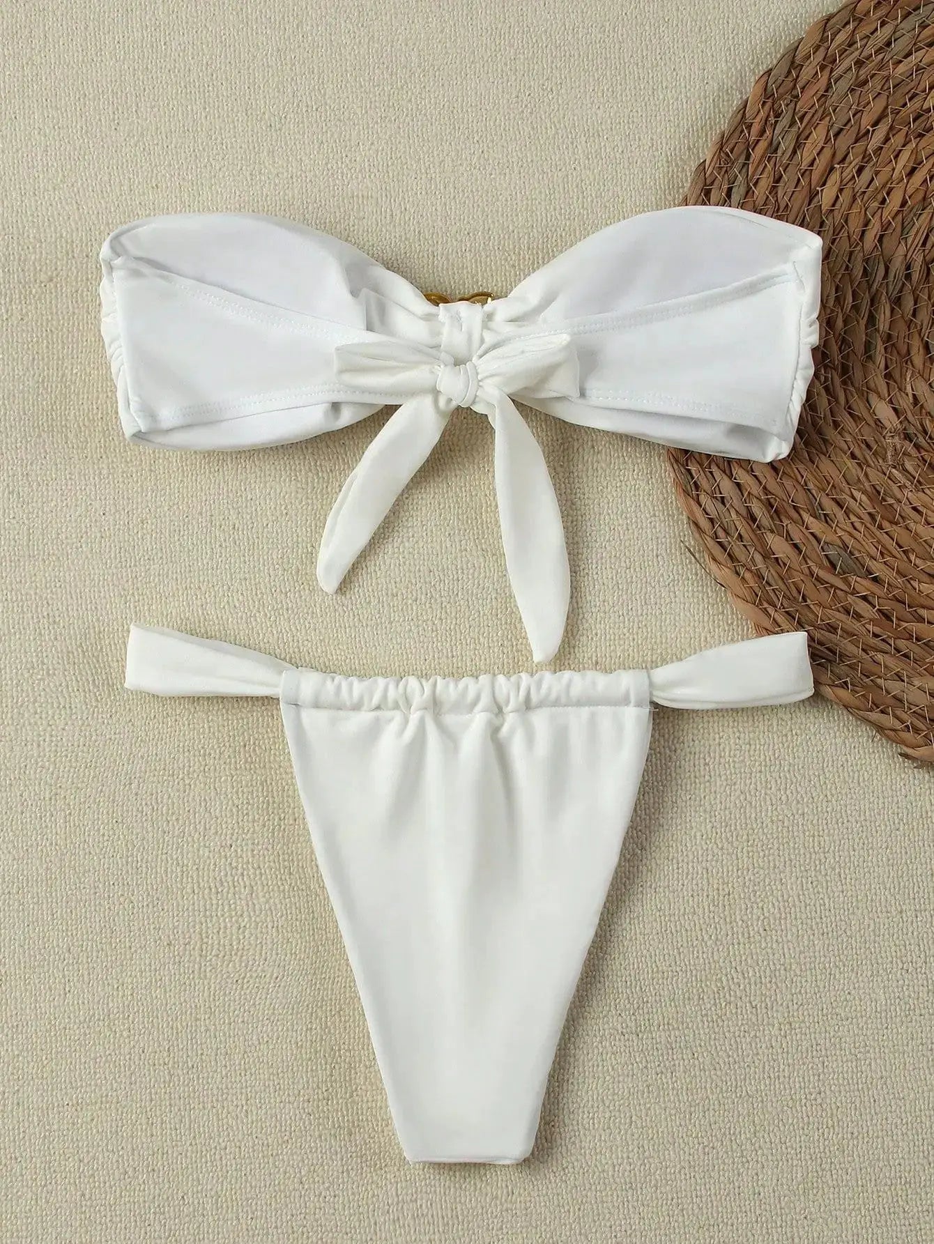 Bandeau bikini set: white strapless top with front knot and matching white thong bottom