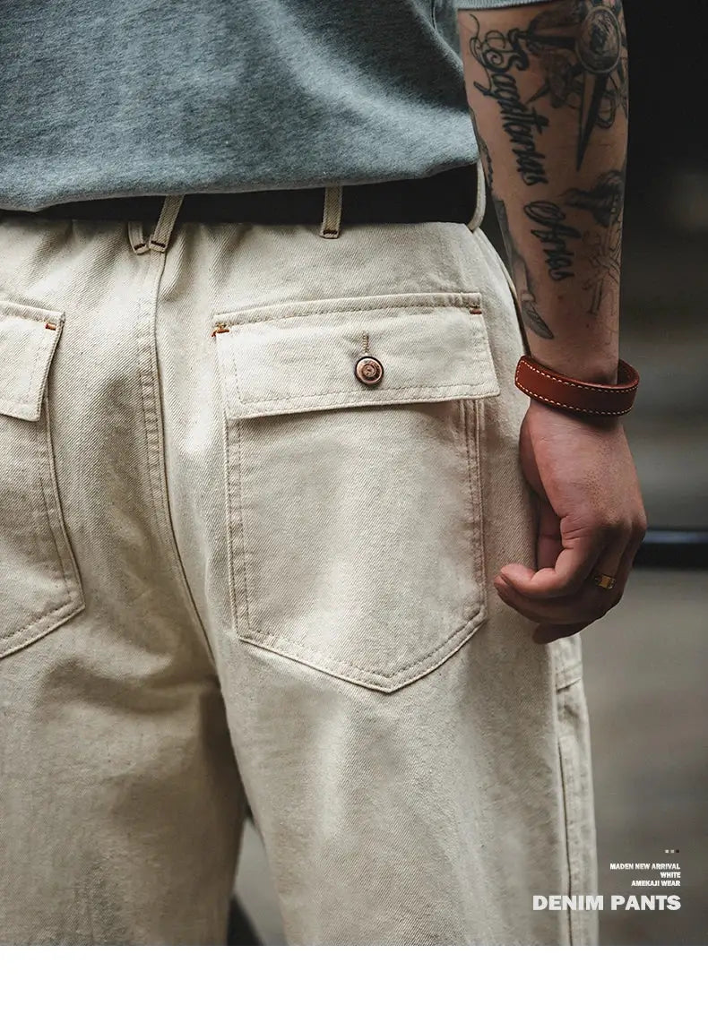 Maden Vintage white denim pants with back flap pockets and button closures, loose straight fit.