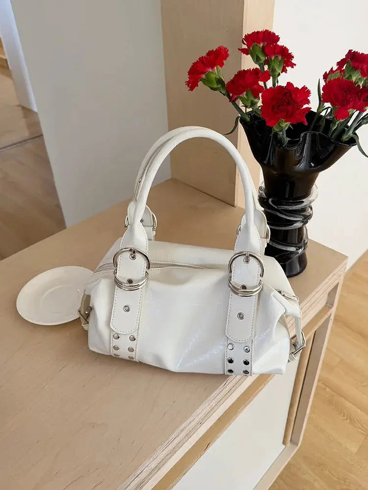 Shoulder bag for women with rivets in white PU leather and silver hardware