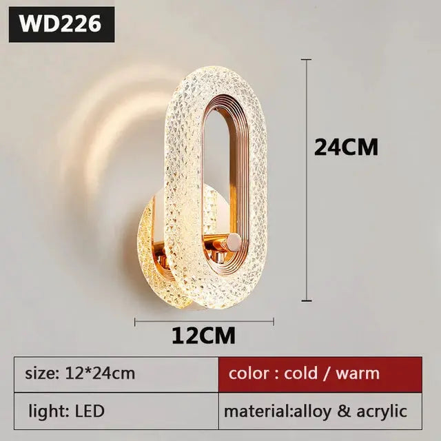 Modern Nordic LED wall lamp with acrylic diamond shade and iron base in gold tone, 24 cm tall, 12 cm wide