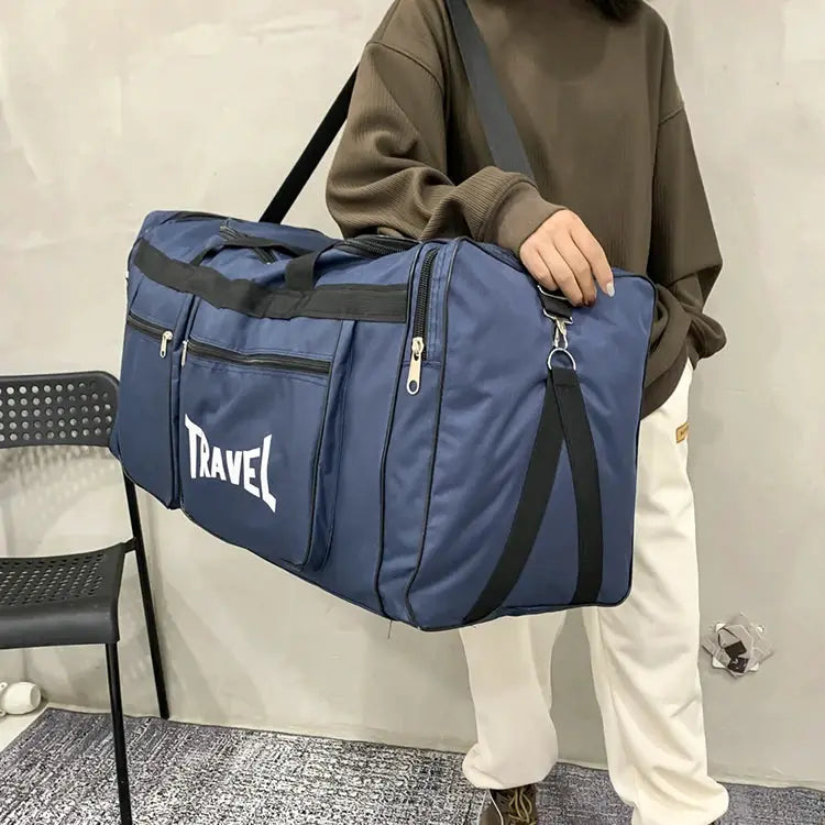 Large-capacity blue travel luggage bag with multiple zipper pockets
