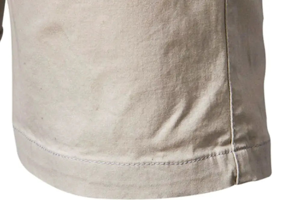 Men's cotton shorts, beige color, close-up hem detail