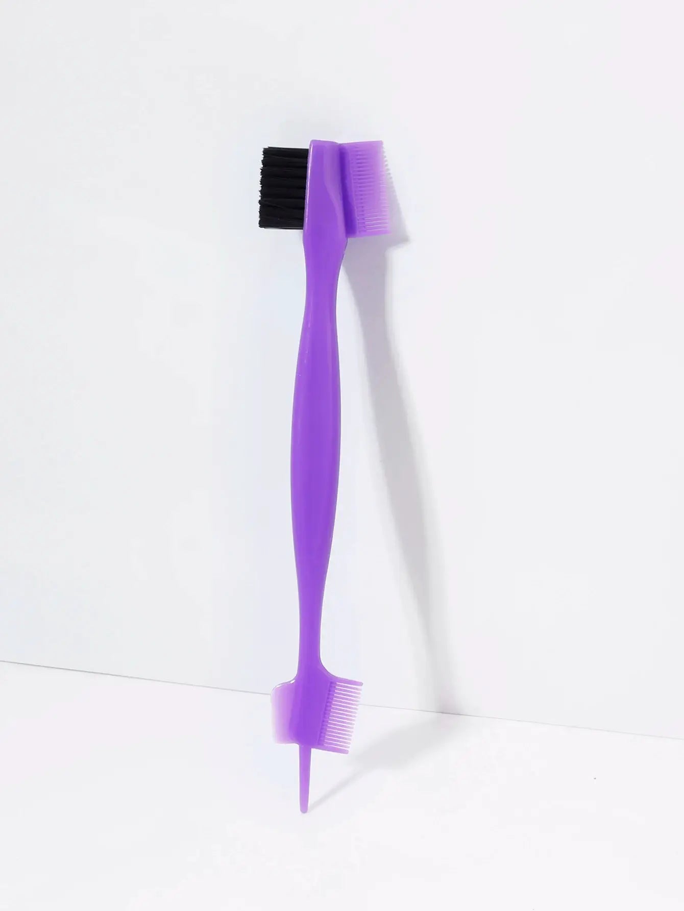 Simples Market purple edge control brush with dual-ended brush and comb for styling wigs.